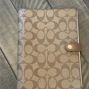 Coach Signature Canvas Organizer in Brown and Tan.